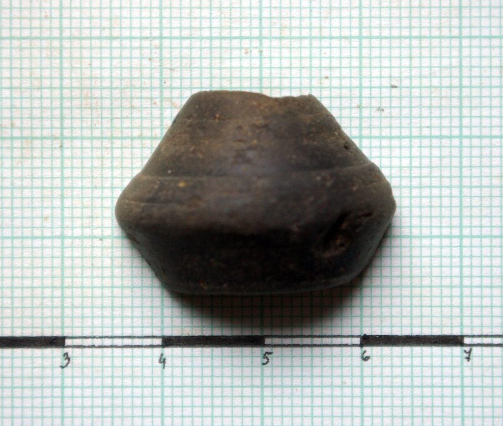 Fragment of spindle-whorl (?)