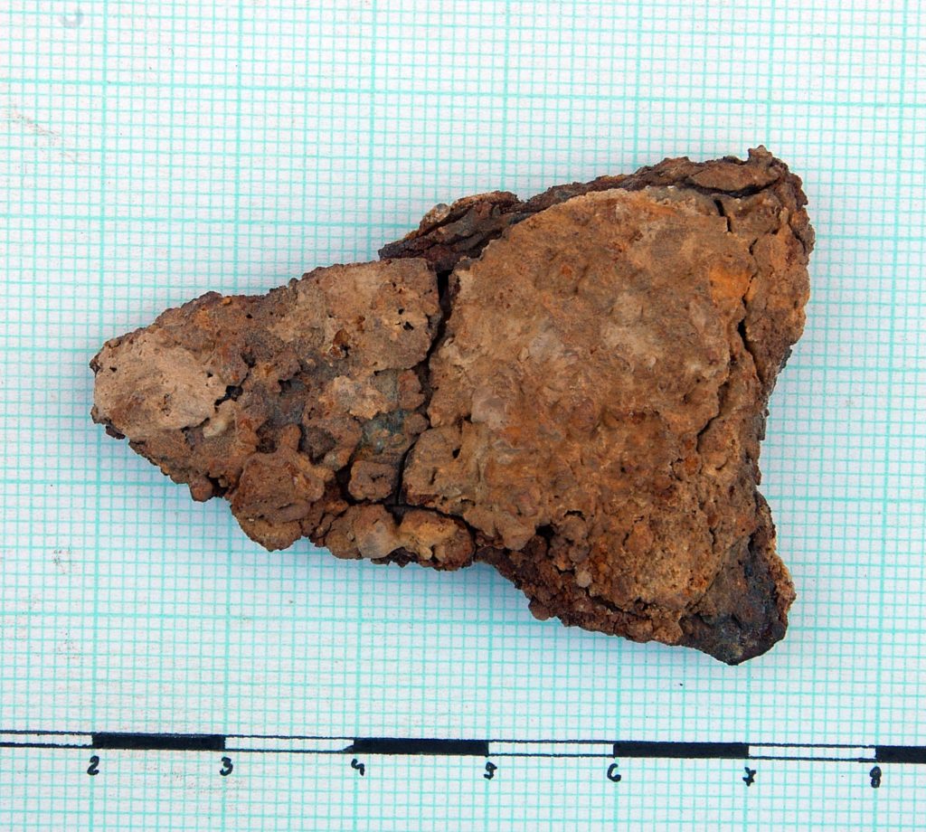 Fragment of pointed iron object in two pieces