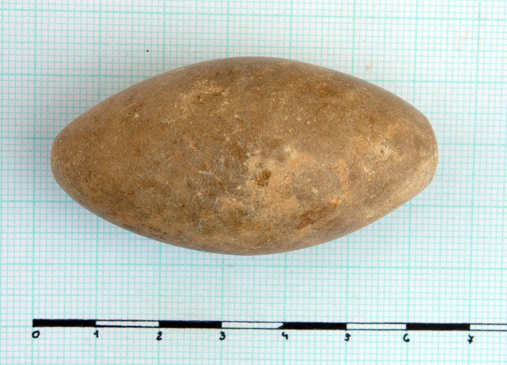 Biconical to egg-shaped polished stone